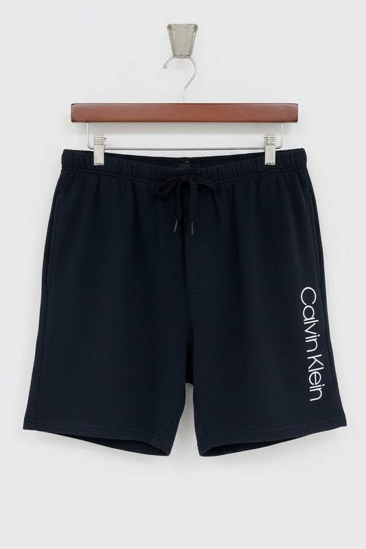 Short Lounge Calvin Klein 🇺🇸 color azul navy y logo en blanco Talla XL