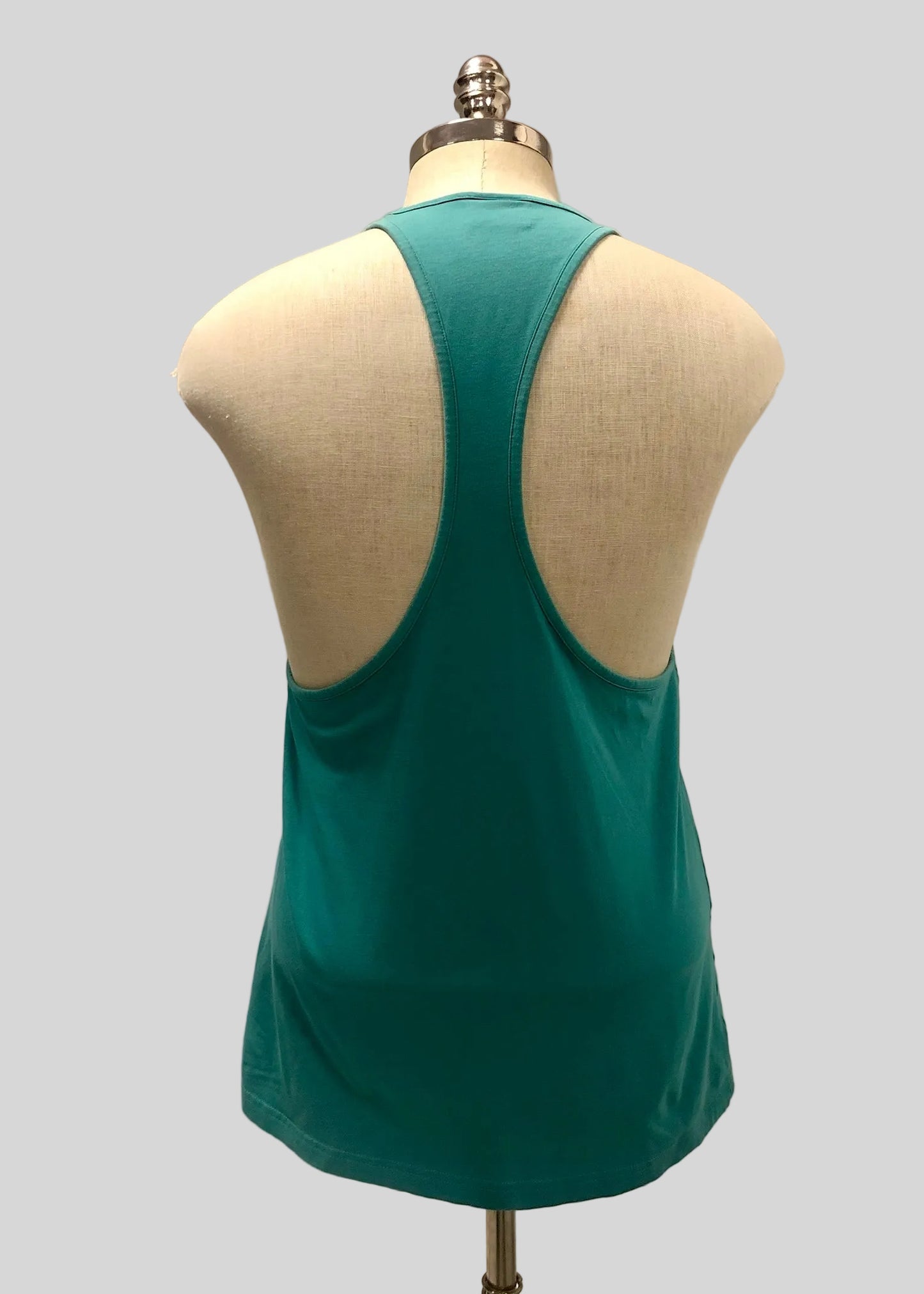 Camiseta de entrenamiento sin mangas Gymshark 🏋🏽 color verde esmeralda y logo en negro Talla S