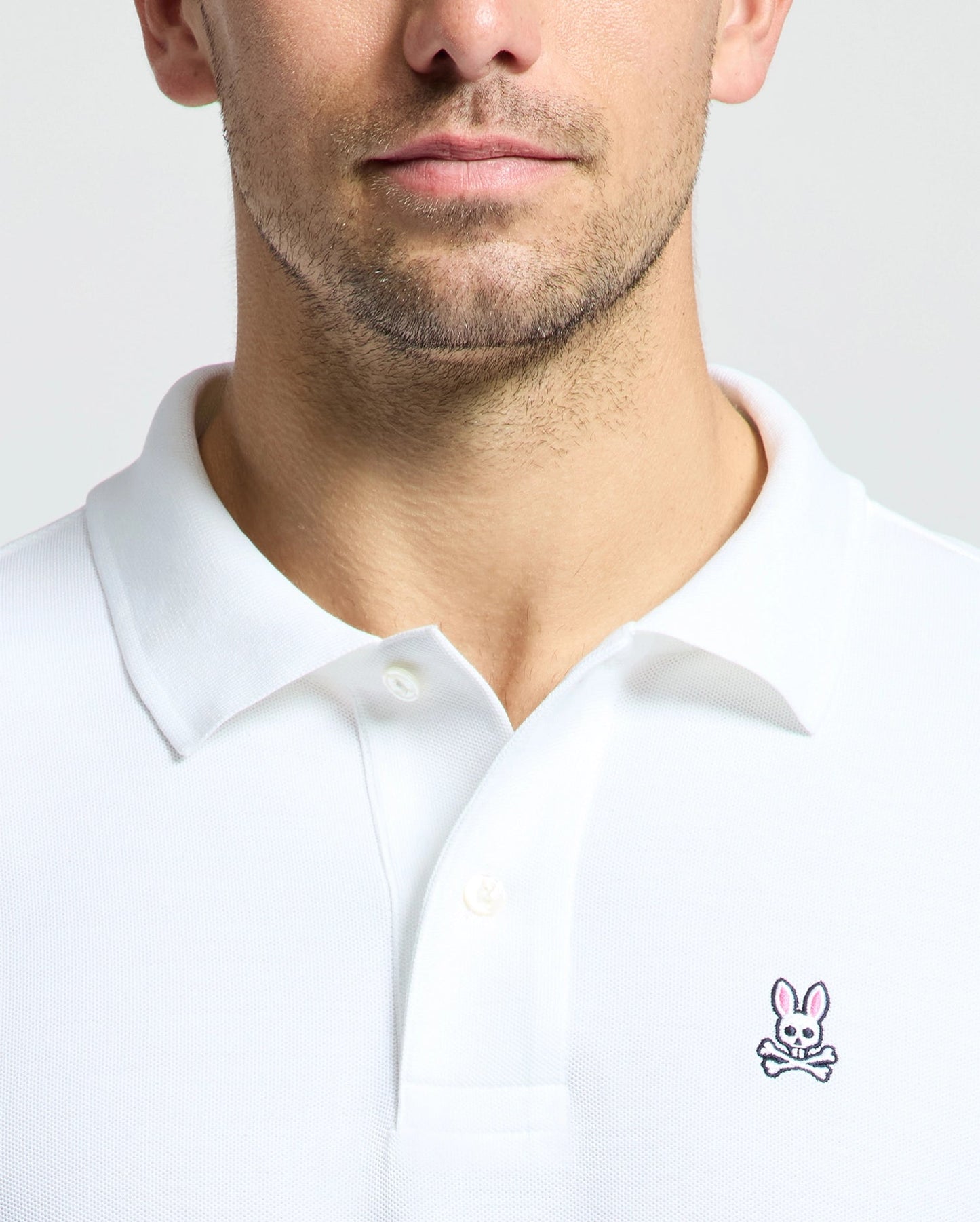 Camiseta Polo Psycho Bunny 🐰  color blanco clásico Talla 5XL Entalle Regular