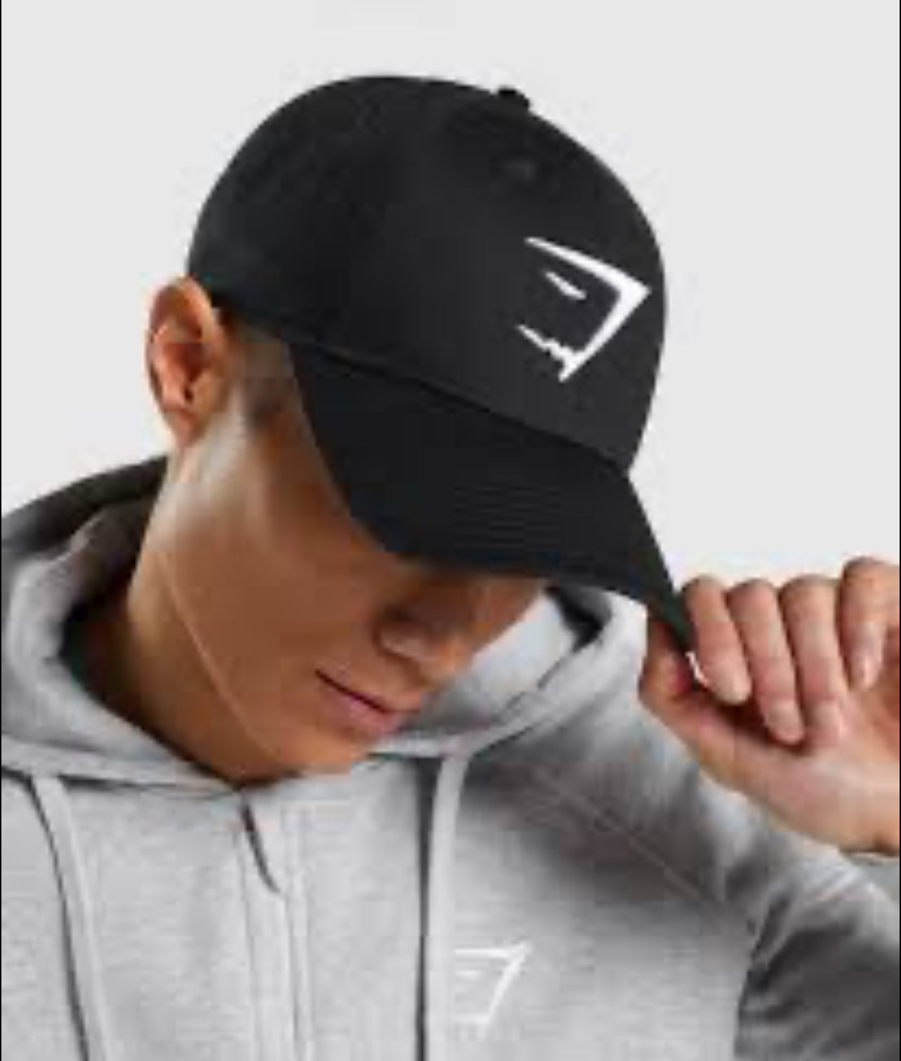 Gorra Gymshark 🏋🏽 color negro y logo tradicional en color blanco