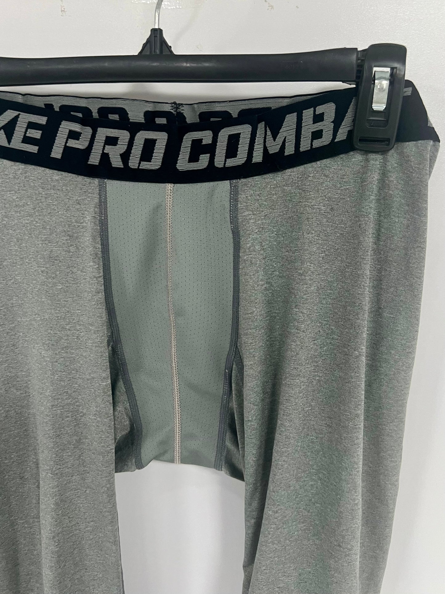 Malla de entrenamiento licra Nike ✔️ Pro Dri-FIT de 3/4 de largo para hombre en Color gris cintura negro Talla L