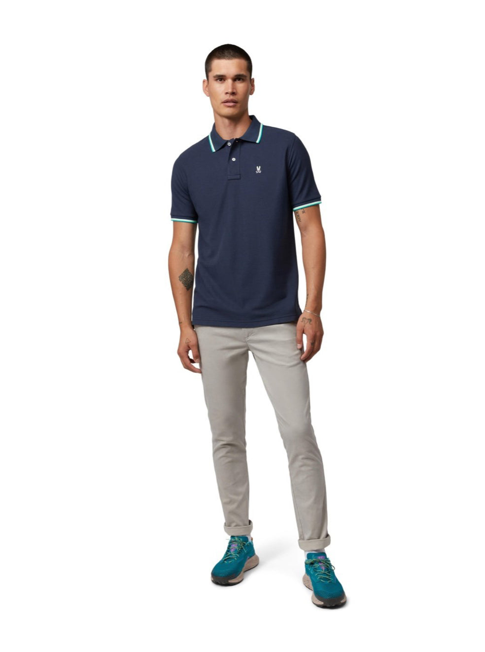 Camiseta Polo Psycho Bunny 🐰 Pique en color azul navy con diseño de cuello en blanco y verde Talla M Entalle Regular