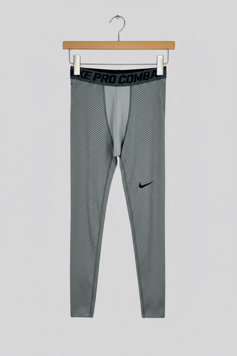 Malla de entrenamiento licra Nike ✔️ Pro Dri-FIT para hombre con diseño de rayas en color gris Talla M