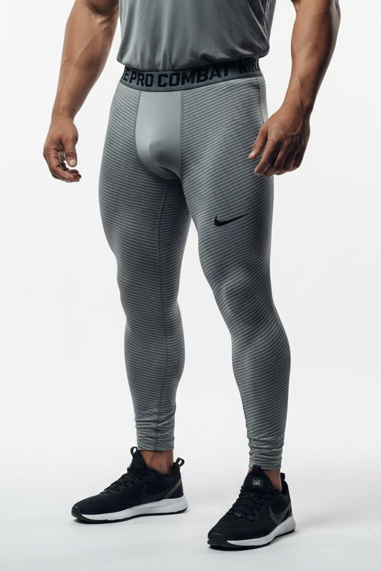 Malla de entrenamiento licra Nike ✔️ Pro Dri-FIT para hombre con diseño de rayas en color gris Talla M