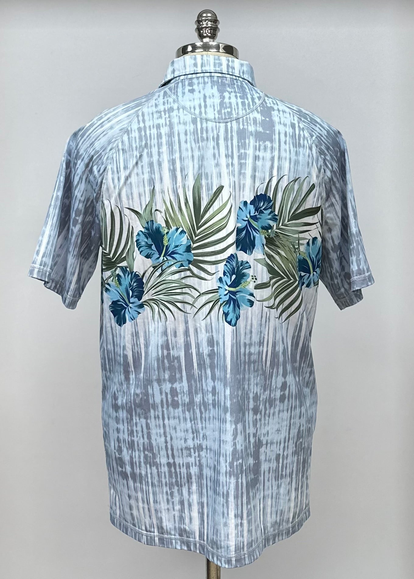 Camiseta Polo Tommy Bahama 🐬 color gris y blanco con diseño floral Talla L Entalle Regular