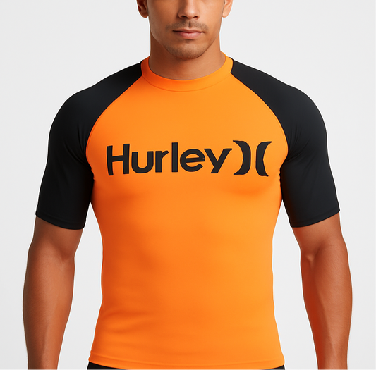 Camiseta de baño Hurley 🏄🏽‍♂️  color negro y naranja intenso y logo en negro Talla S