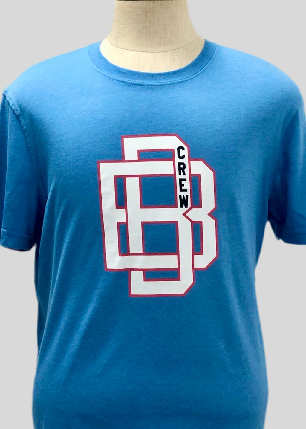 Camiseta cuello redondo Brooks Brothers 🐑 color celeste y diseño de logo universitario Talla L