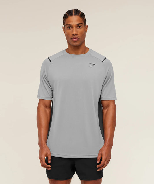 Camiseta de entrenamiento cuello redondo Gymshark 🏋🏽 color gris con líneas y logo en negro Talla L y XL