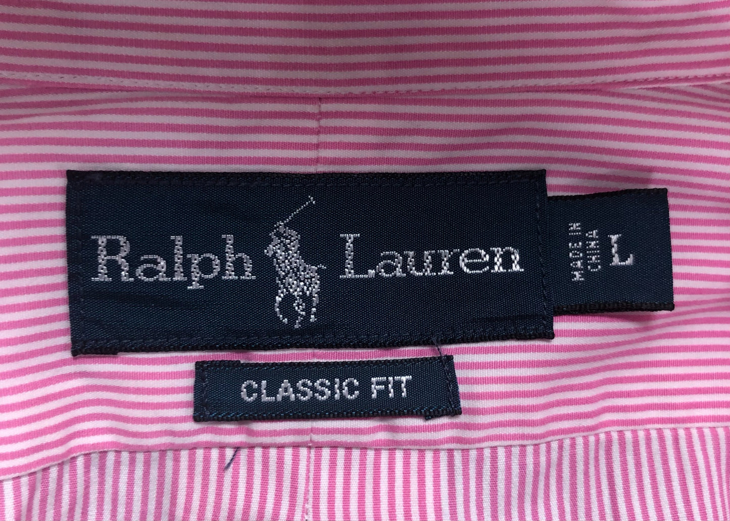 Camisa de botones Polo Ralph Lauren 🏇🏼 color blanco con patron de rayas finas en color rosado Talla L Entalle Clasico