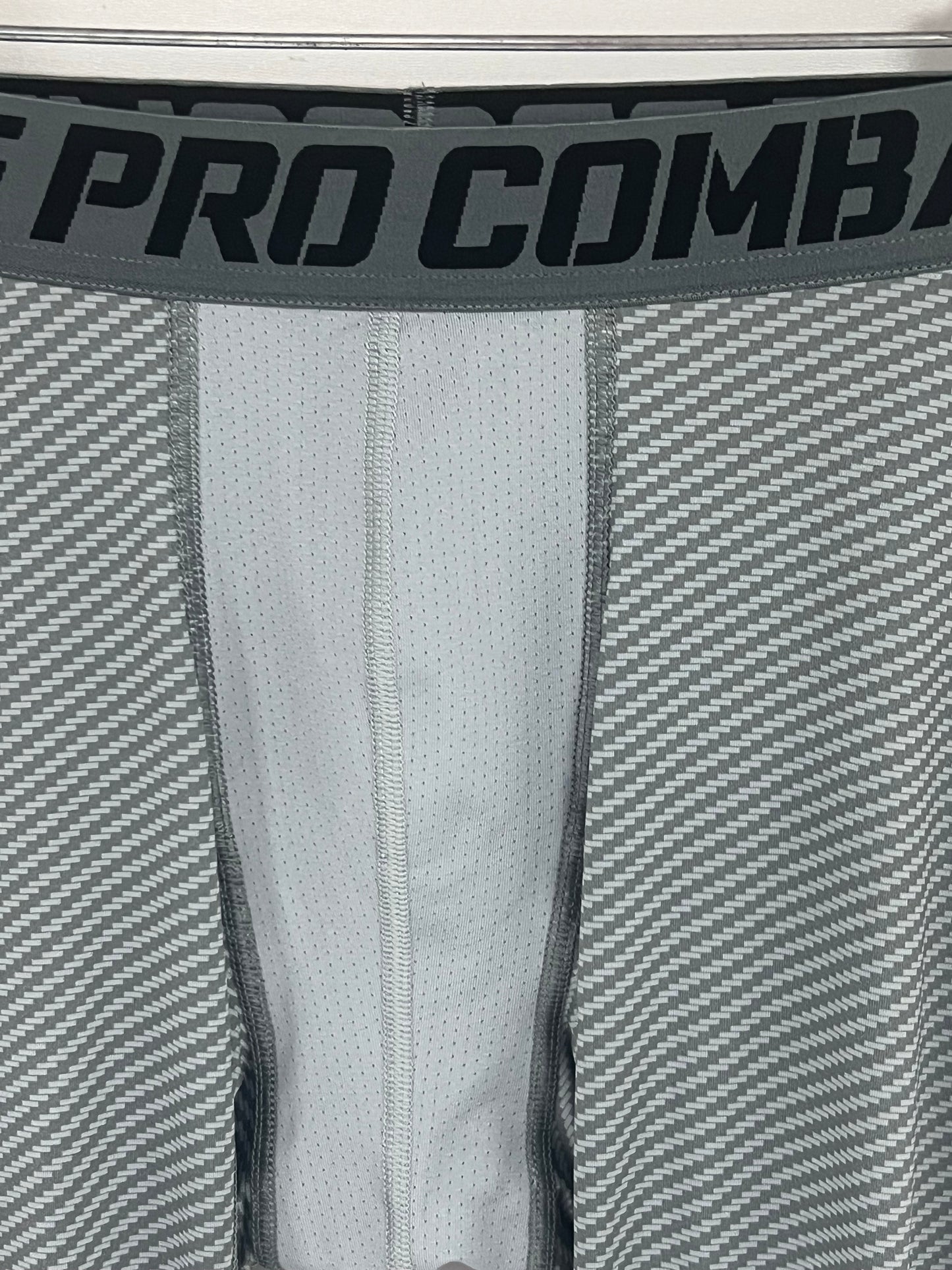 Malla de entrenamiento licra Nike ✔️ Pro Dri-FIT para hombre con diseño de rayas en color gris Talla M
