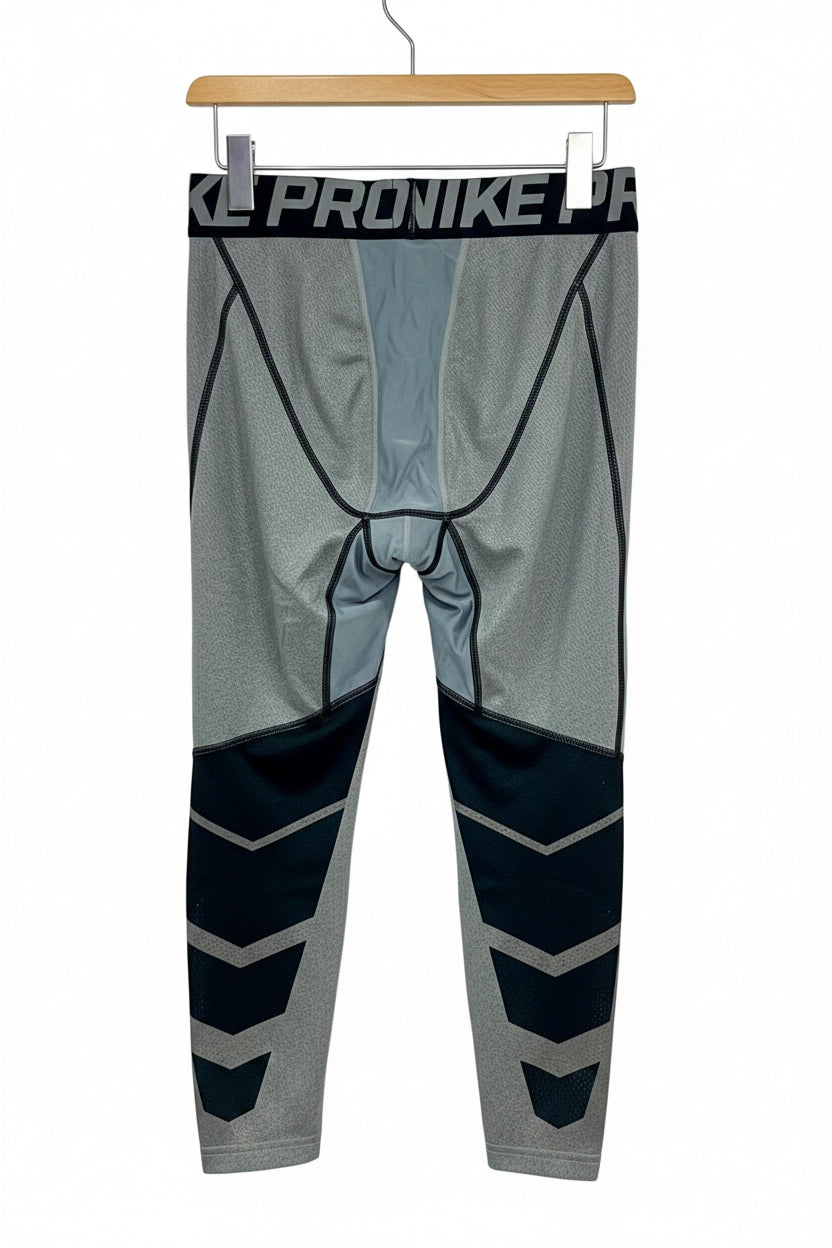 Malla de entrenamiento licra Nike ✔️ Pro Dri-FIT de 3/4 de largo para hombre en Color gris y cintura en negro Talla L