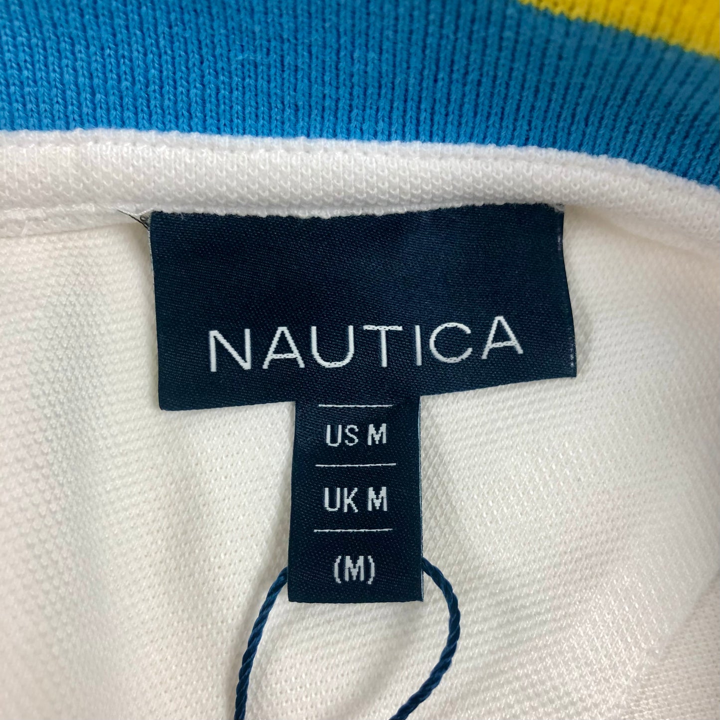 Camiseta Polo Nautica ⚓️ color blanco y diseño de cuello Talla M Entalle Regular