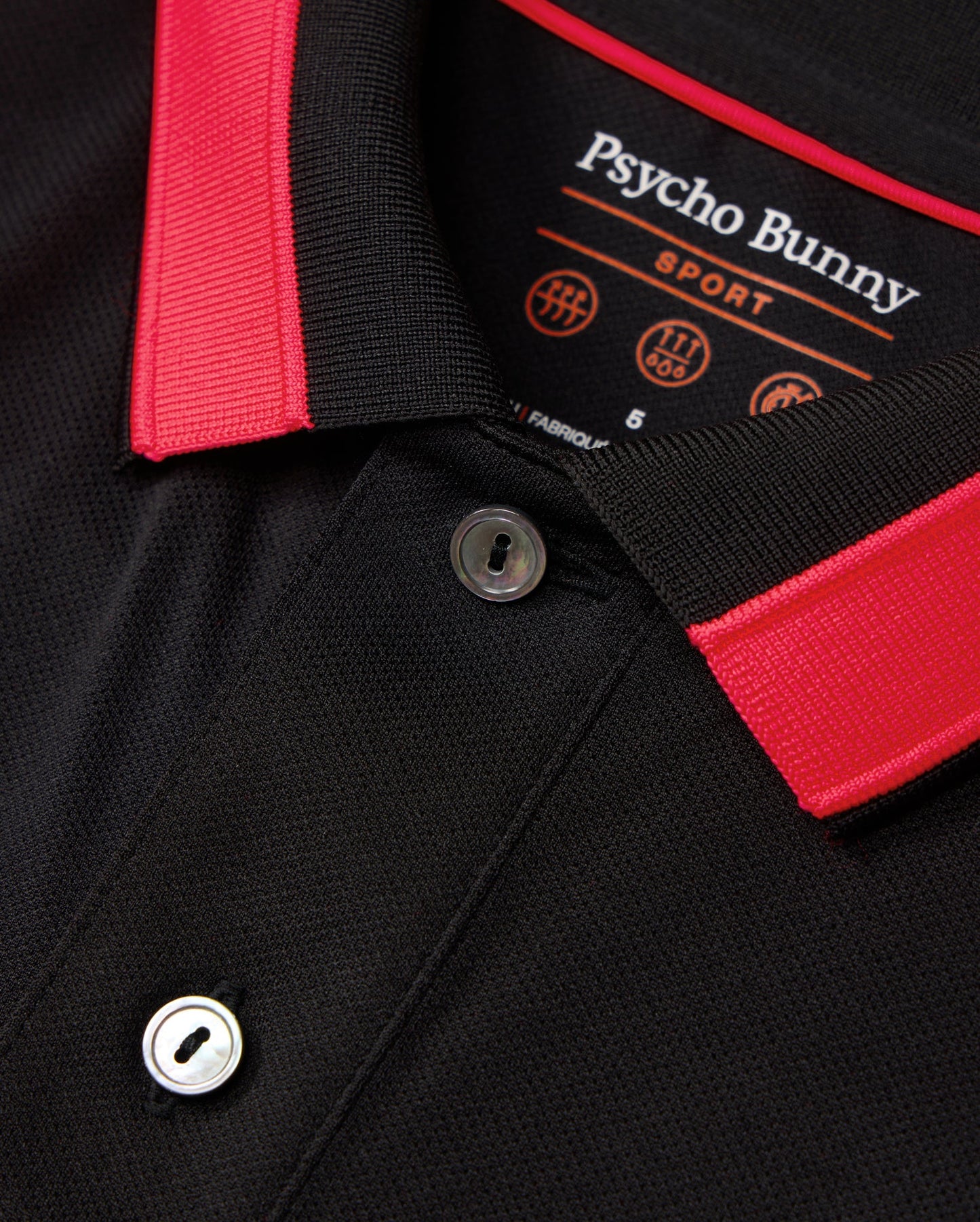 Camiseta Polo Psycho Bunny 🐰  Micro mesh en color negro y rosado con diseño de cuello Talla M Entalle Regular