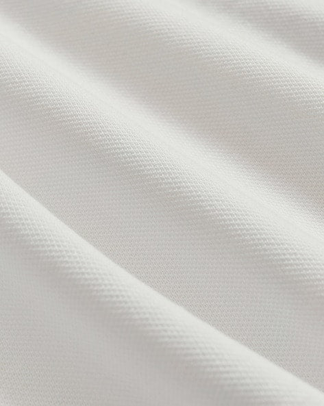 Camiseta Polo Brooks Brothers 🐑 color blanco con franjas en azul y amarillo Talla M Entalle Slim Fit