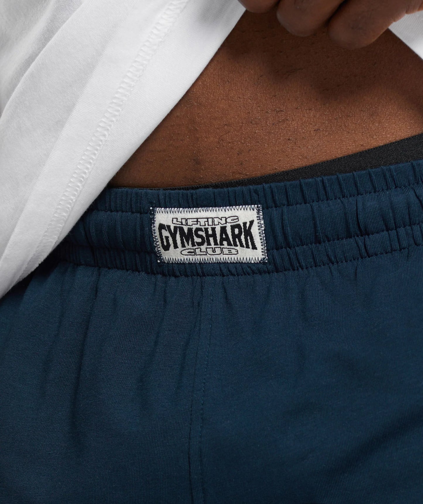 Short Lounge Gymshark 🏋🏼‍♂️ color azul navy y logo en naranja Talla L