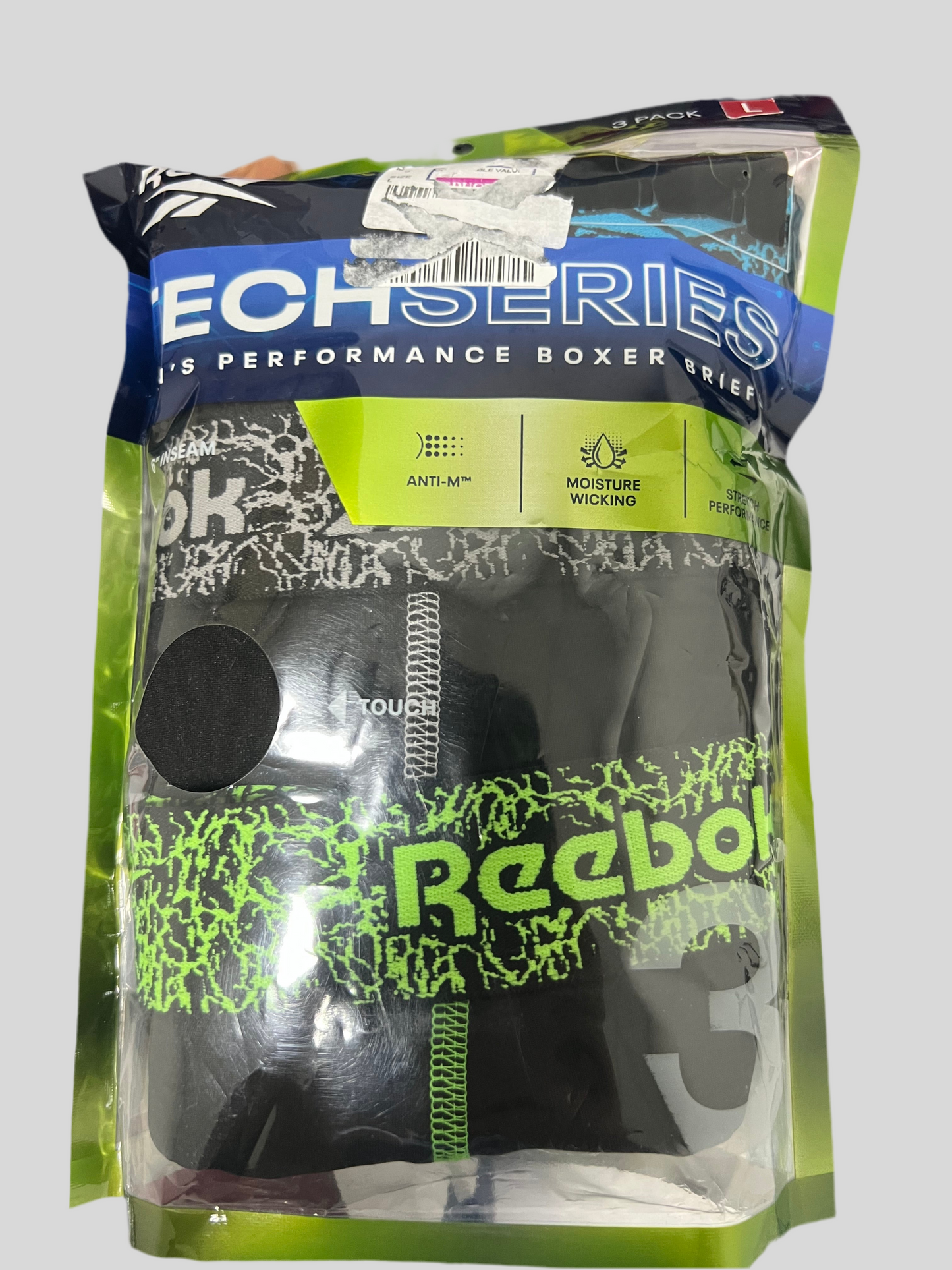 Combo de 3 Boxers Briefs Reebok Tela Performance en color negro y gris Largo Regular Talla L