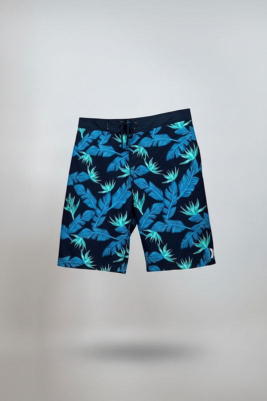 Short de baño Hurley 🏄🏽‍♂️ color negro con patrón de hojas en celeste Talla 32