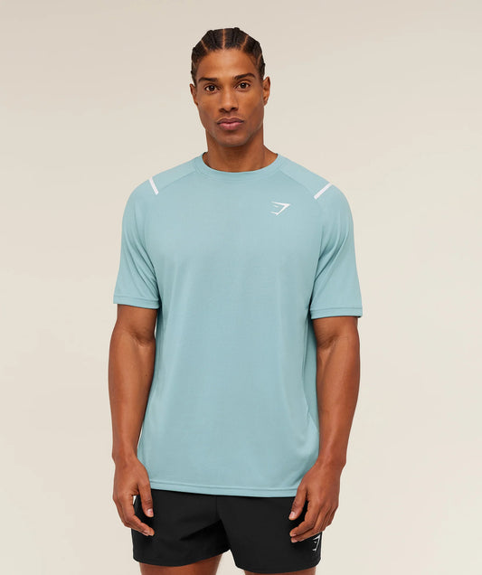 Camiseta de entrenamiento cuello redondo Gymshark 🏋🏽 color celeste con líneas y logo en blanco Talla L