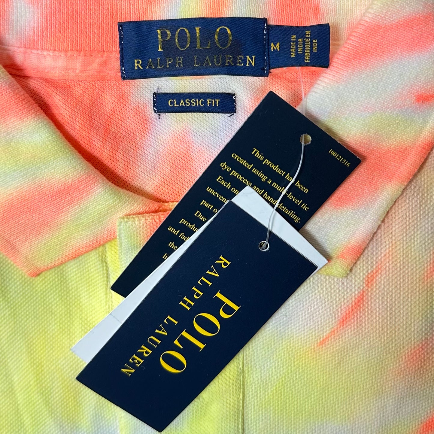 Camiseta Polo Ralph Lauren 🏇🏼Color blanco con diseño Tie Dye circular en naranja, amarillo y morado Talla S, M Entalle Clásico