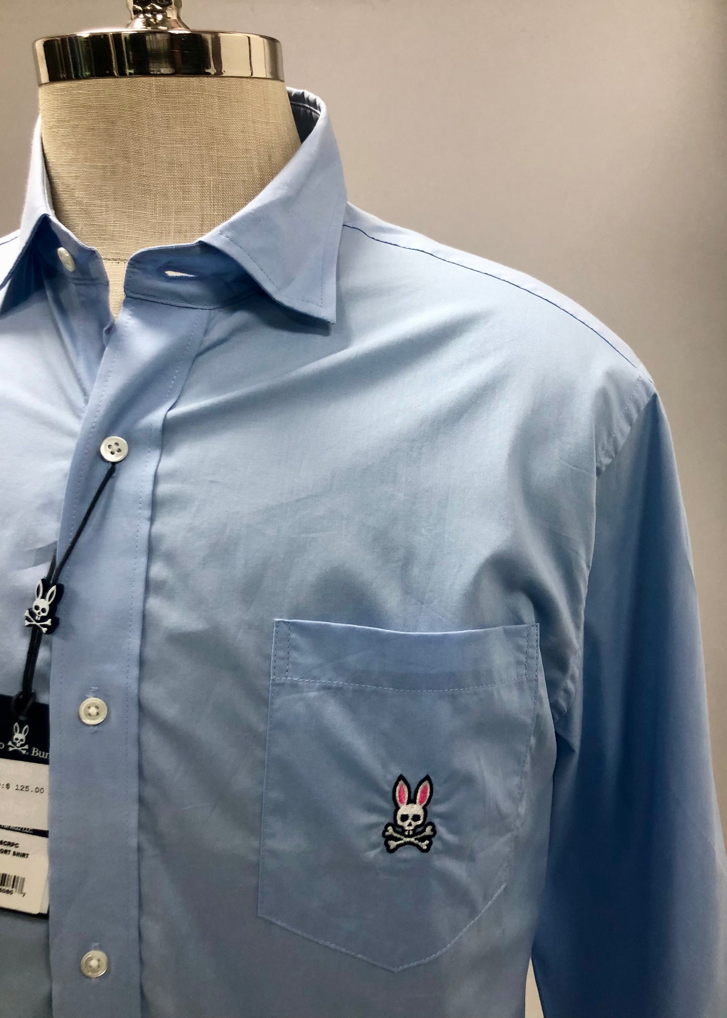Camisa de botones Psycho Bunny 🐰  Color celeste claro con logo tradicional Talla L Entalle Regular