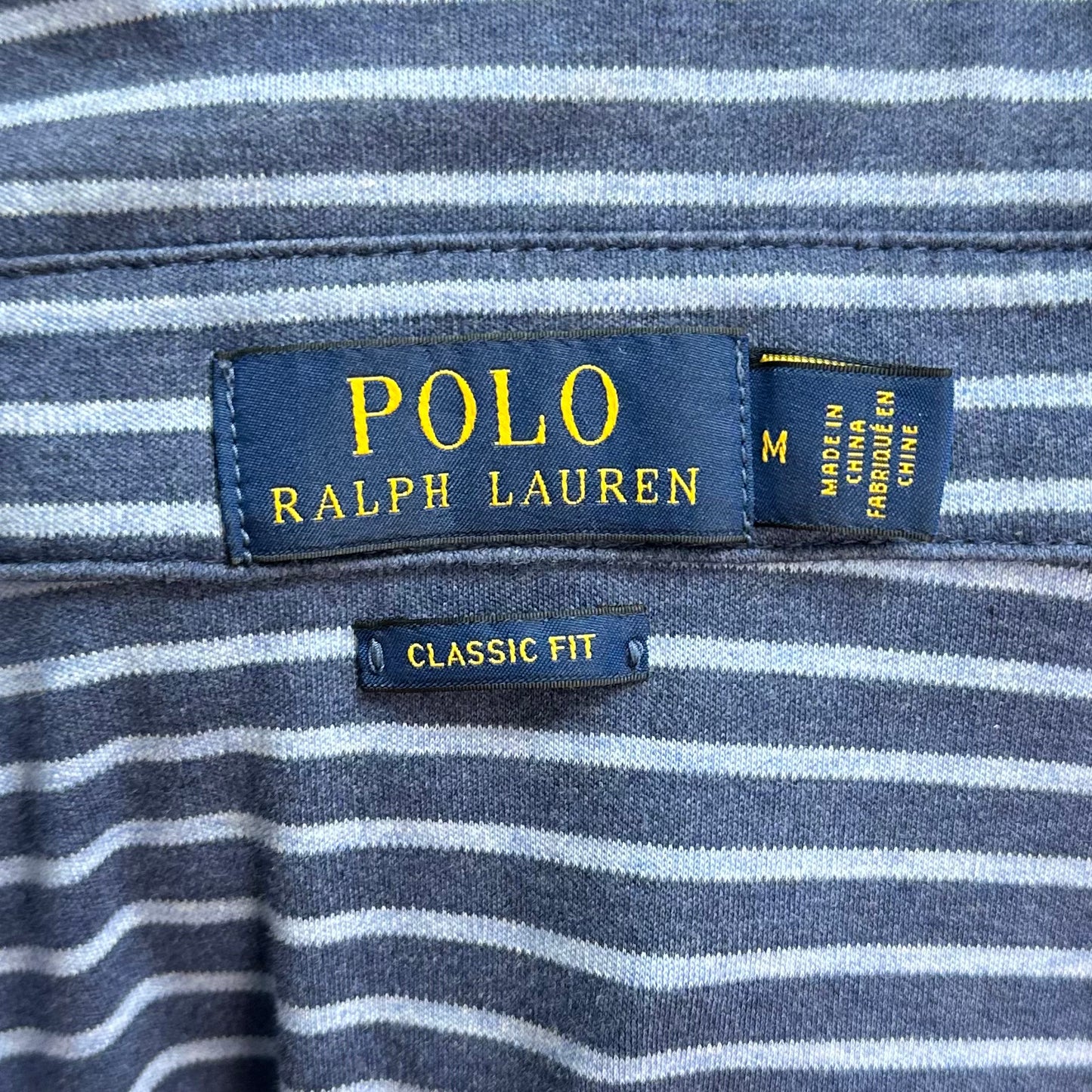 Camiseta Polo Ralph Lauren 🏇🏼 Con patrón de rayas color azul navy y celeste Talla M Entalle Clásico