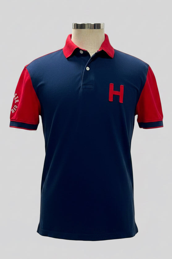Camiseta Polo Tommy Hilfiger 🇺🇸 color azul navy y mangas y cuello en rojo Talla L Entalle Regular (ver descripción)