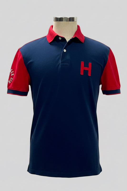 Camiseta Polo Tommy Hilfiger 🇺🇸 color azul navy y mangas y cuello en rojo Talla L Entalle Regular (ver descripción)