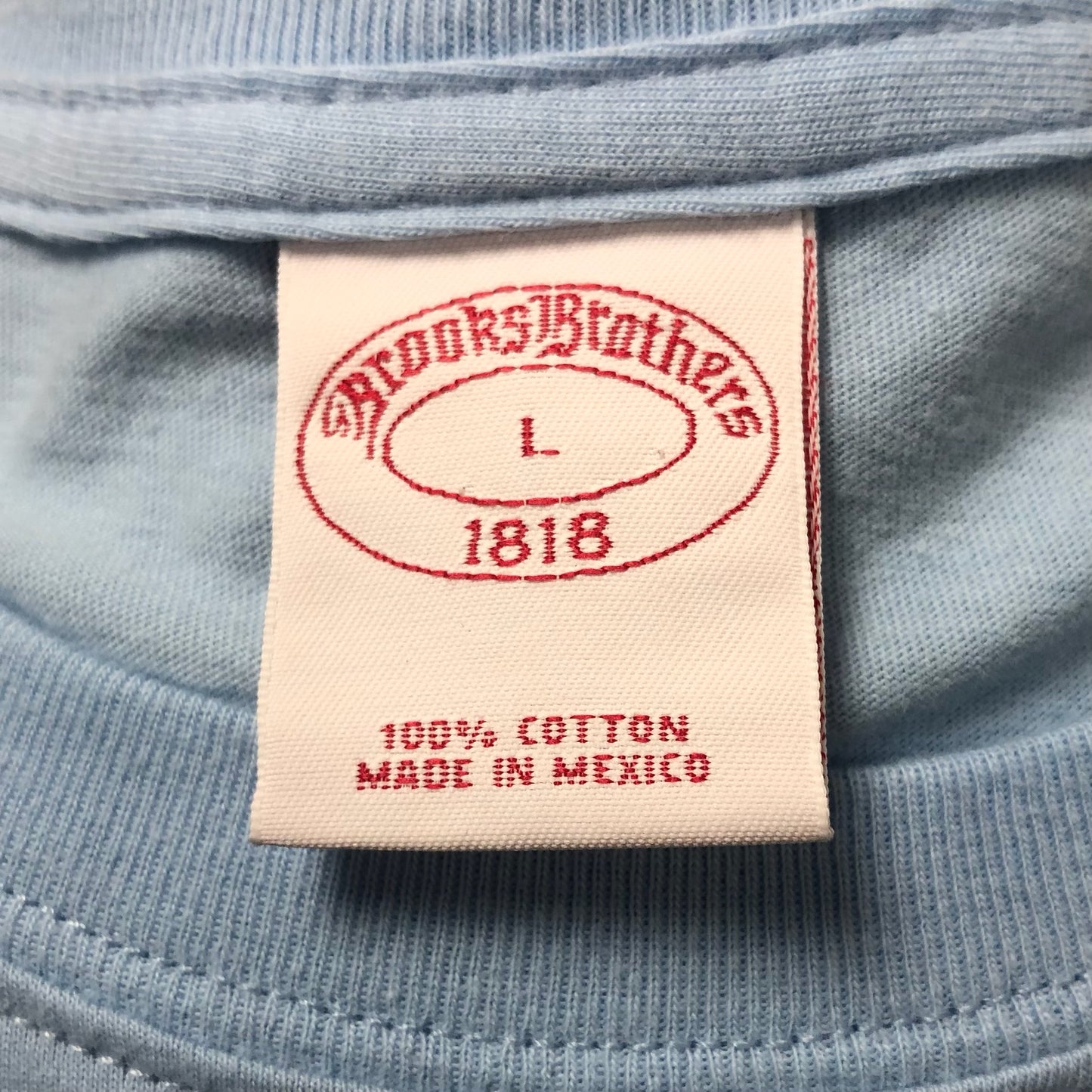 Camiseta cuello redondo Brooks Brothers 🐑 color celeste y logo de pez en azul navy Talla L