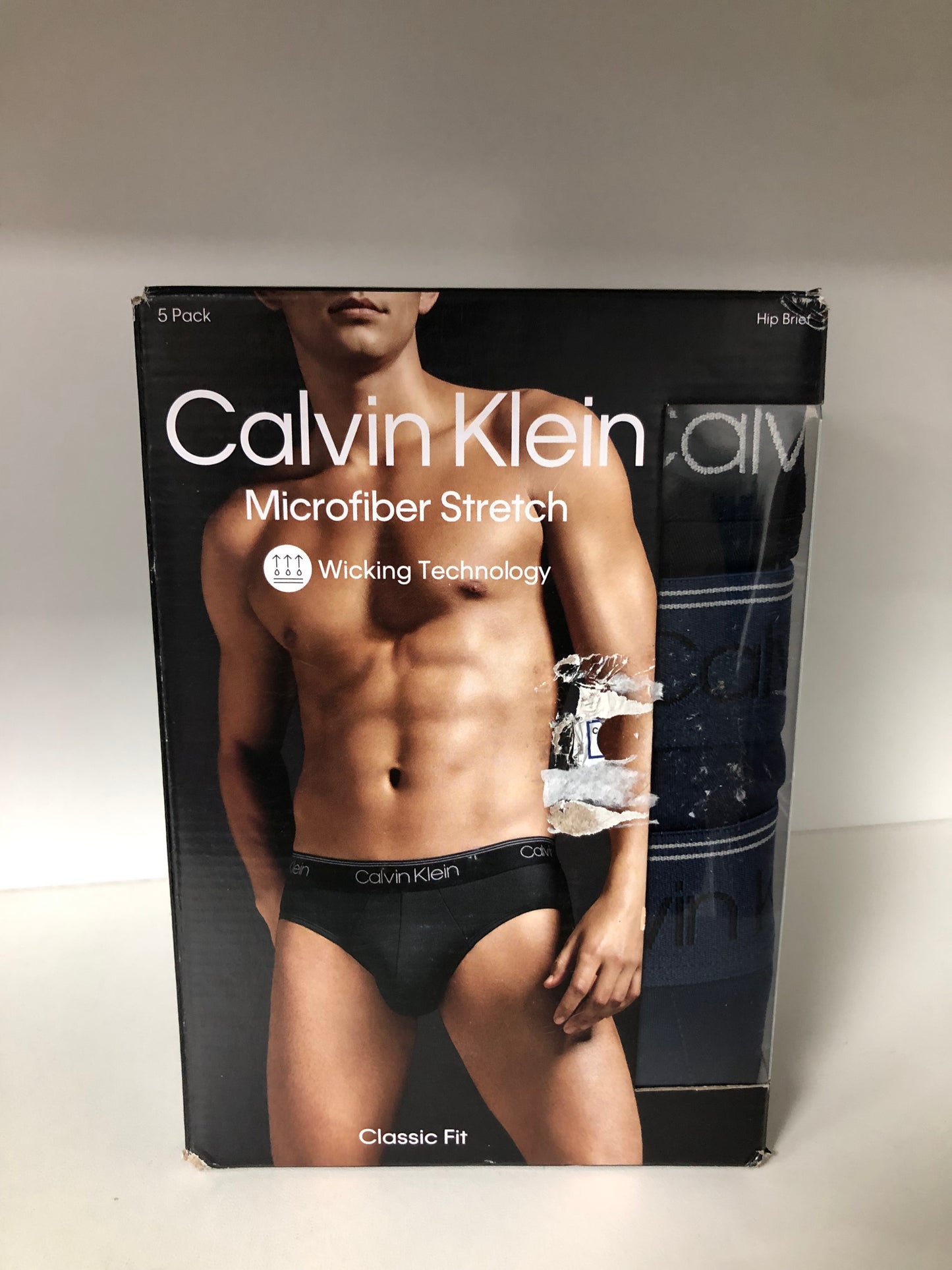 Paquete de 5 Calzoncillos a la cintura Calvin Klein - Tela microfibra stretch en color negro, azul y gris Talla XL