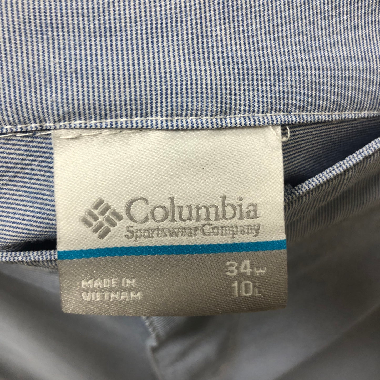 Short Híbrido Columbia 🔷 Tela performance color celeste talla L (34)