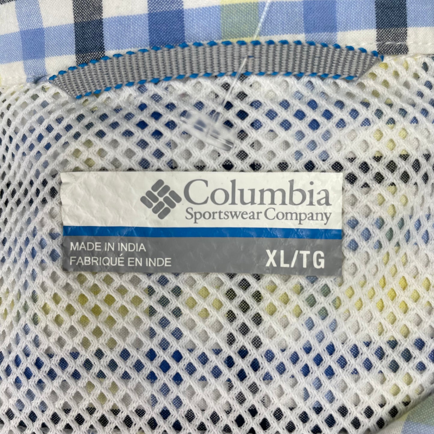 Camisa Columbia 🔹 Color blanco con patrón de cuadros en amarillo, azul y negro Manga corta Talla XL