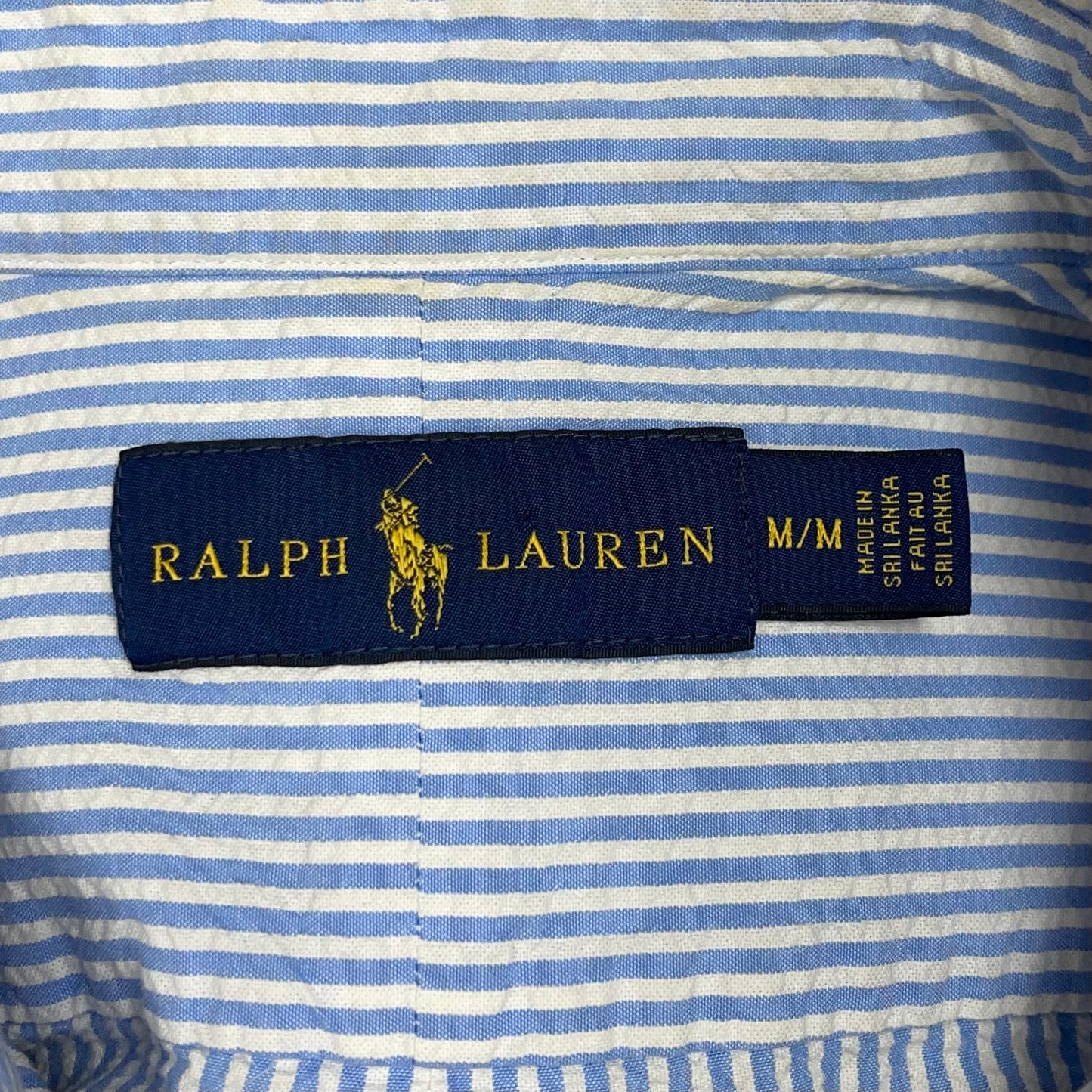 Camisa Polo Ralph Lauren 🏇🏼 Color blanco con patrón de rayas en celeste Tela Seersucker Talla M Entalle Regular