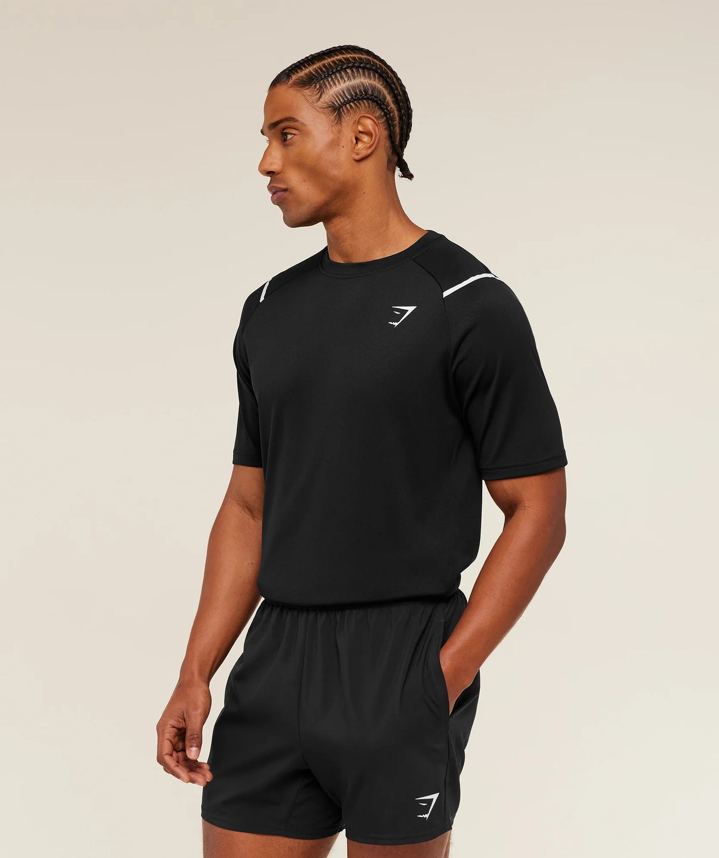 Camiseta de entrenamiento cuello redondo Gymshark 🏋🏽 color negro con líneas y logo en blanco Talla L