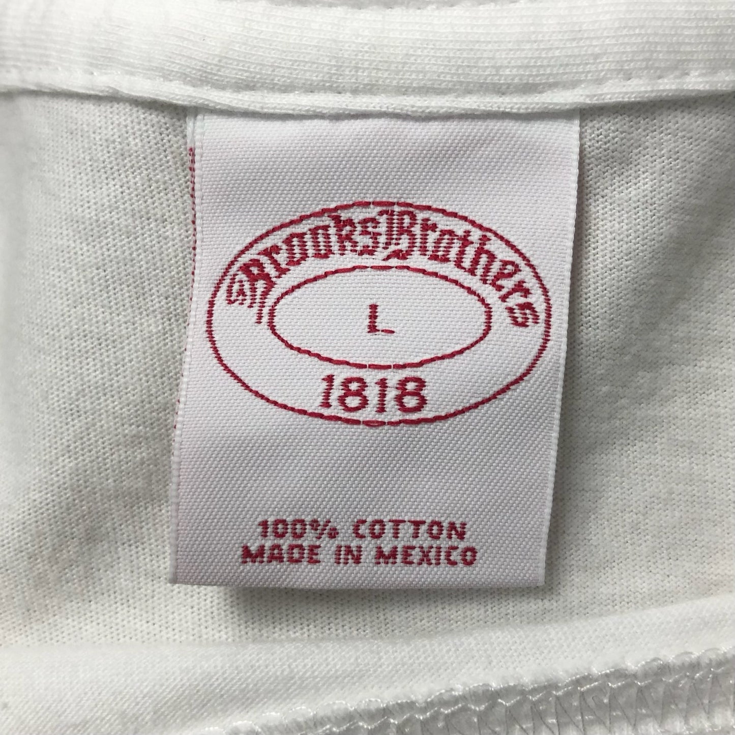 Camiseta cuello redondo Brooks Brothers 🐑 color blanco y logo en azul navy Talla L