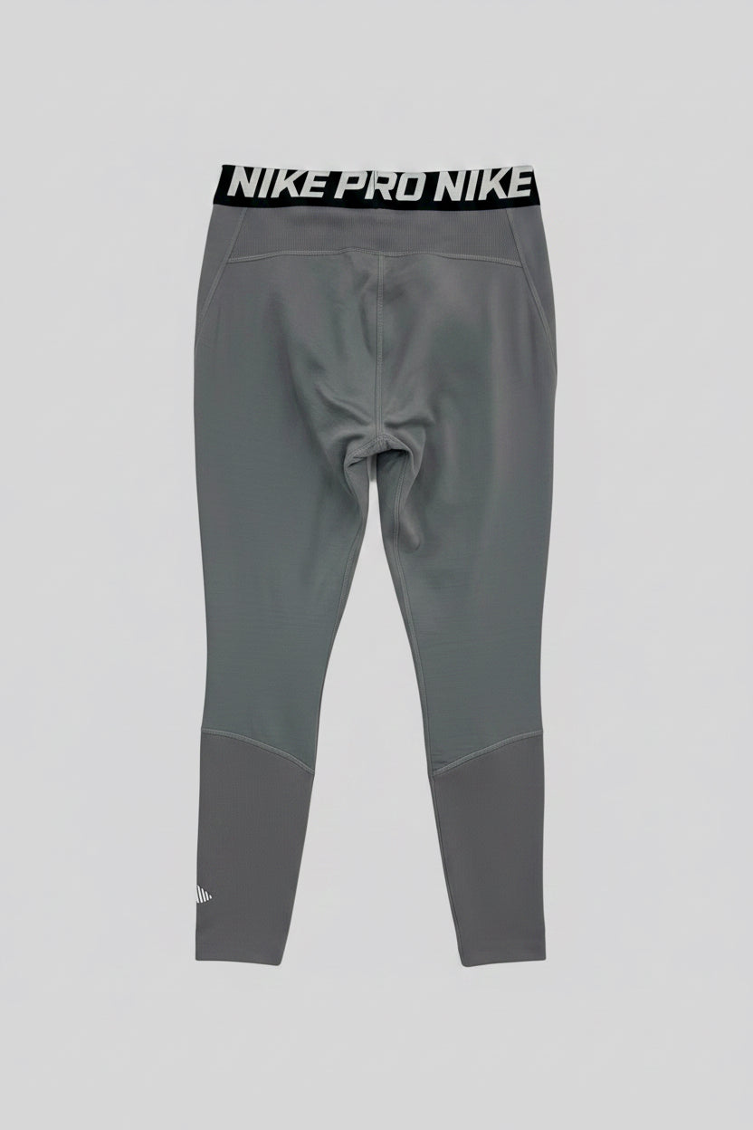 Malla de entrenamiento licra Nike ✔️ Pro Dri-FIT de 3/4 de largo para hombre en Color gris y cintura en negro Talla L