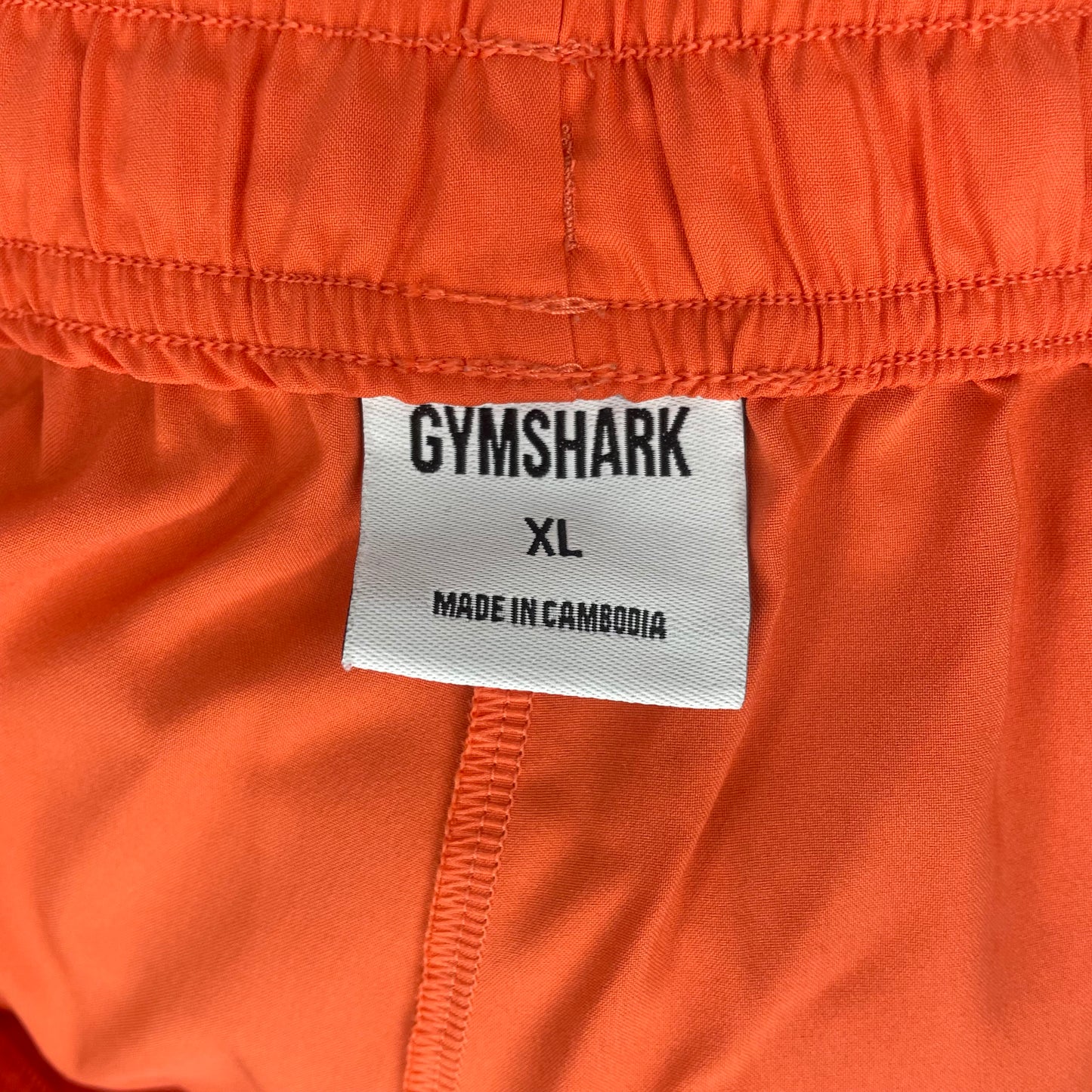 Short Deportivo Gymshark 🏋🏼‍♂️ Tela performance color naranja talla XL