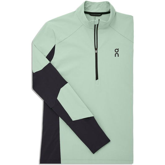 Sueter Jersey On Running 🏃🏻 Impermeable en color verde menta y negro con logo en color gris oscuro Talla L Entalle Regular