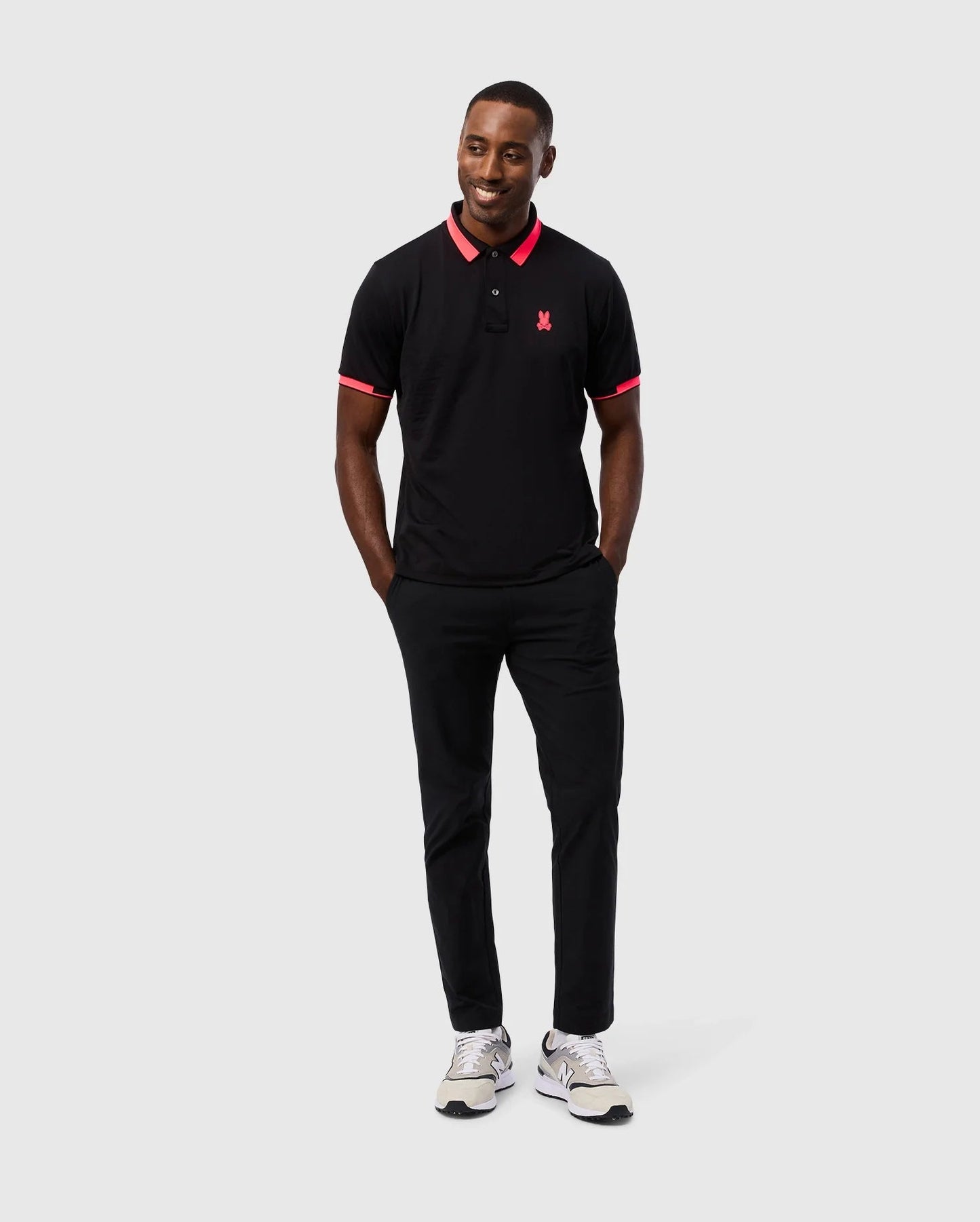 Camiseta Polo Psycho Bunny 🐰  Micro mesh en color negro y rosado con diseño de cuello Talla M Entalle Regular