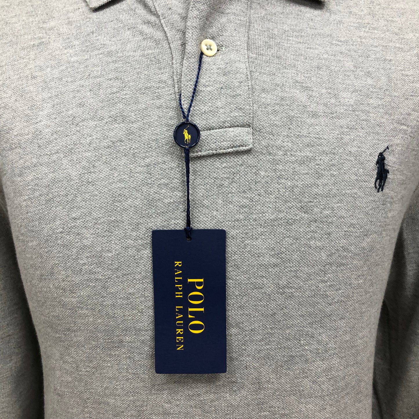 Camiseta Polo Ralph Lauren 🏇🏼color gris claro Manga larga Talla L Entalle Clásico