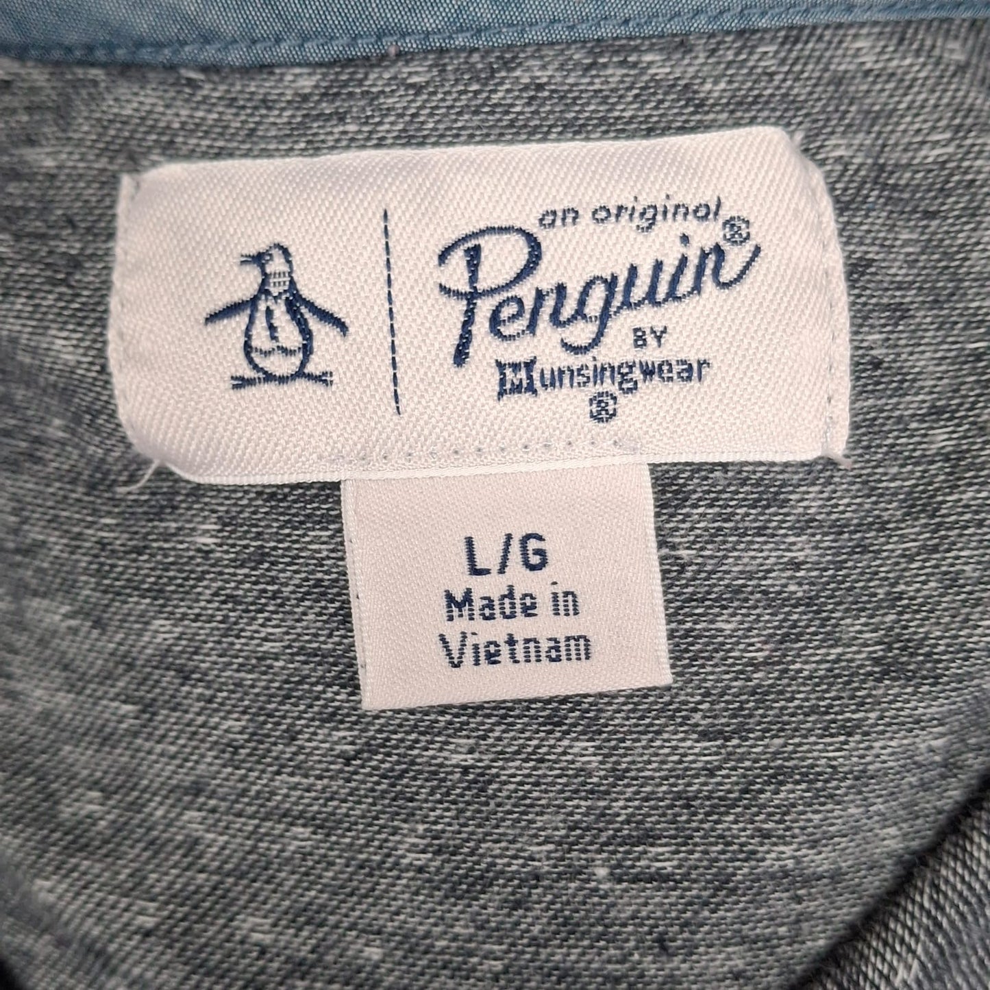 Camiseta Polo Original Penguin 🐧 en color gris y negro Talla L Entalle Regular