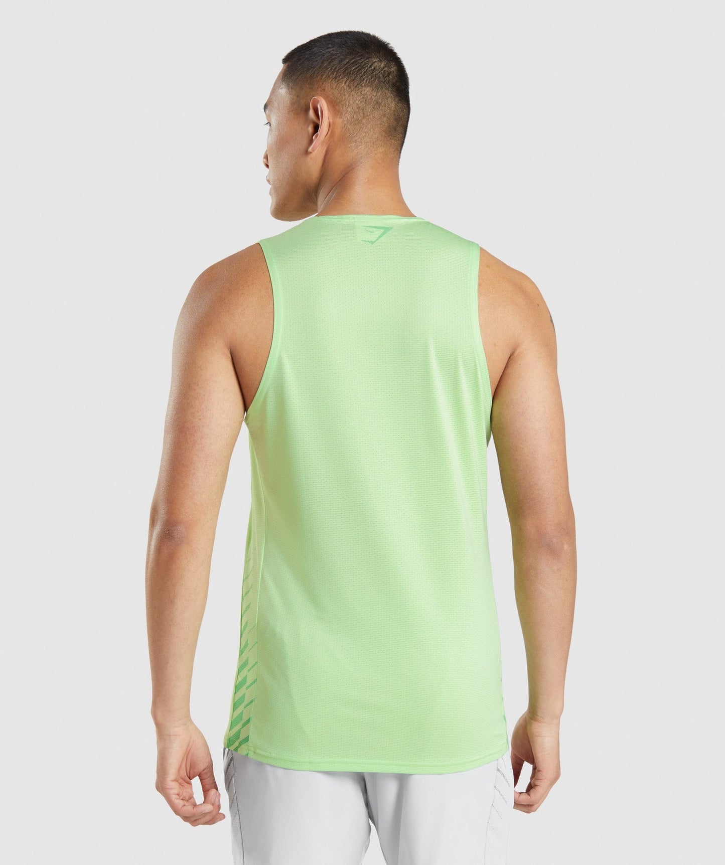 Camiseta de entrenamiento sin mangas Gymshark 🏋🏽 color verde claro y logo en verde Talla L