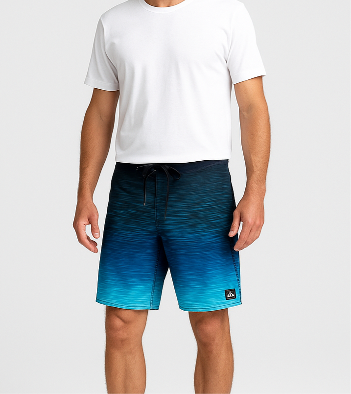 Traje de baño QuickSilver 🏄🏽‍♂️ con diseño degradado en color negro, azul y blanco con logo en color negro Talla Medium (32)