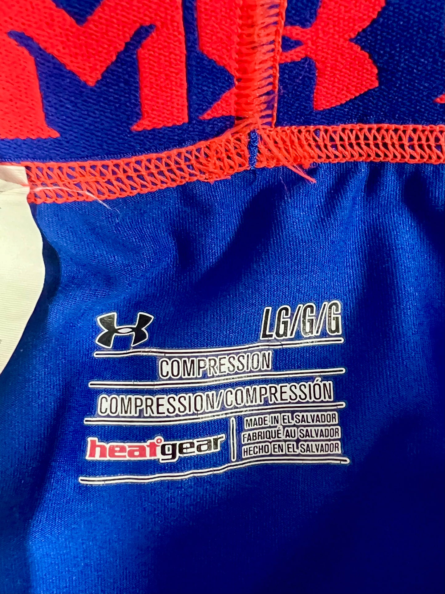 Malla de entrenamiento licra Under Armour 🏋🏽 Pro Dri-FIT para hombre en Color azul intenso y cintura rosado neón Talla L