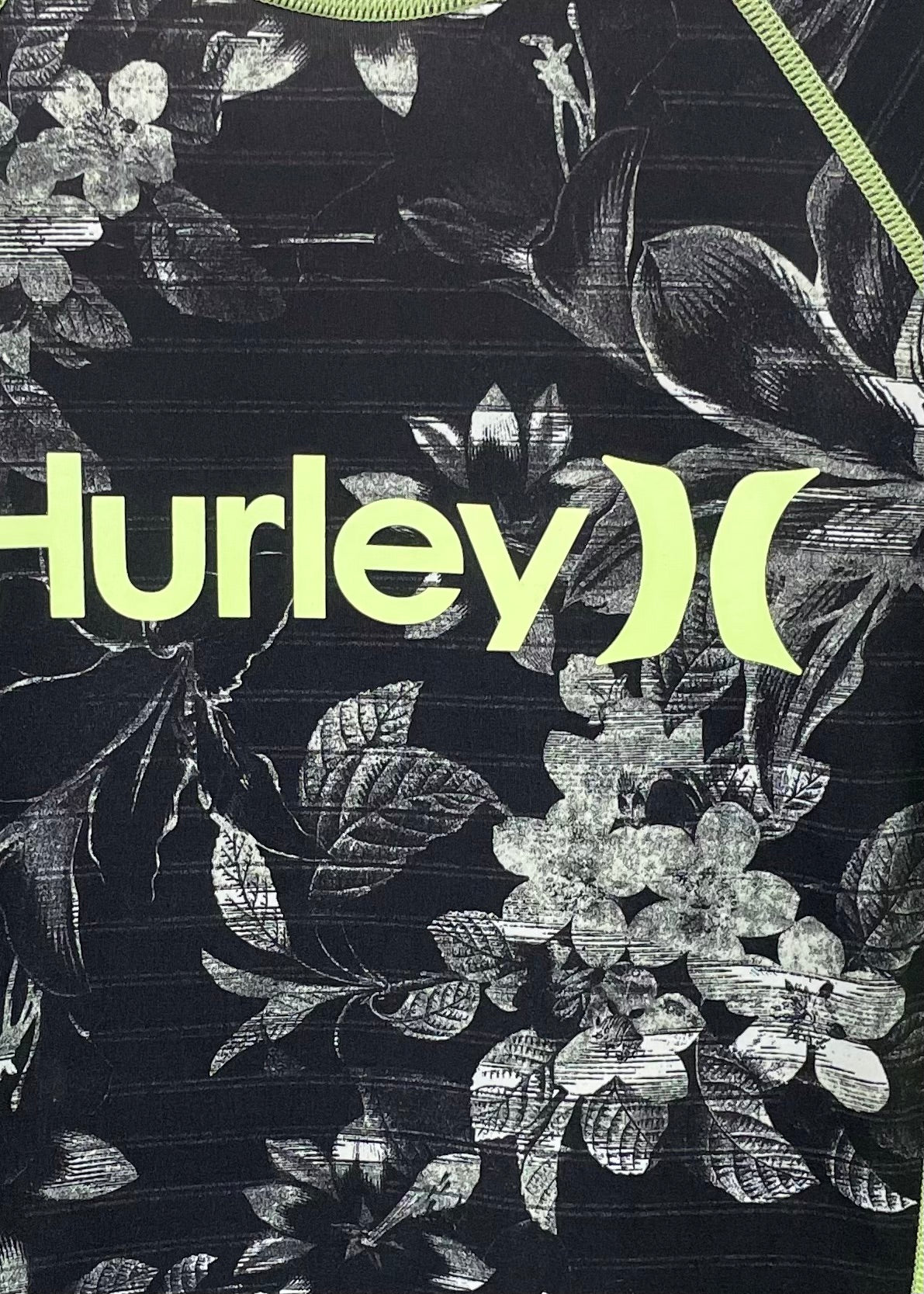 Camiseta de baño Hurley 🏄🏽‍♂️  color negro y verde claro con diseño floral Talla XL de mujer