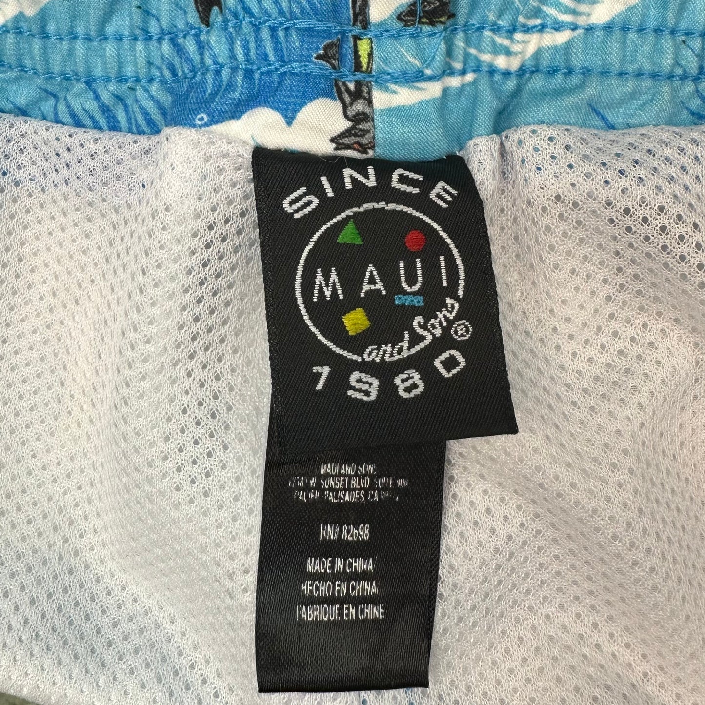 Short de baño Maui and sons 🏄🏽‍♂️ color azul con diseño de surfistas talla L