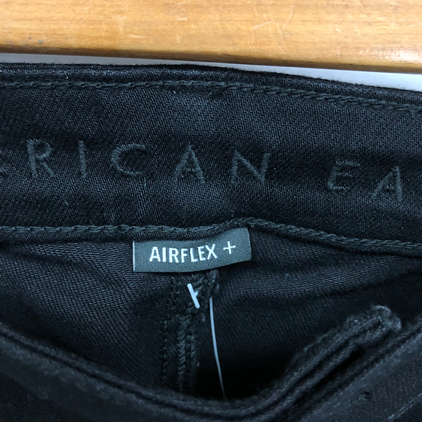 Pantalon jeans American Eagle 🦅  color negro Talla 36x32 Corte Athletic Skinny