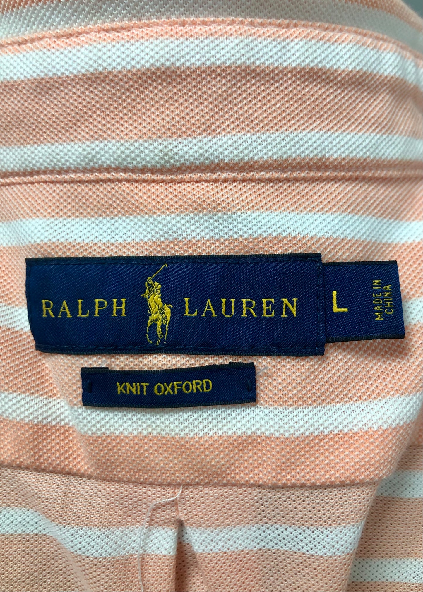 Camiseta Polo Ralph Lauren 🏇🏼 (Knit Oxford) color blanco con patrón del rayas en naranja claro Talla L Entalle Regular