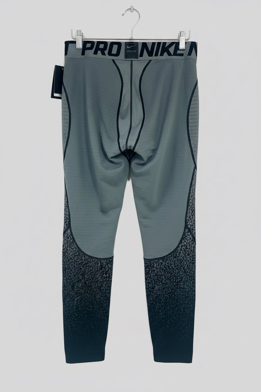 Mallas de entrenamiento licra Nike ✔️ Pro Dri-FIT de hombre color gris con diseño degradado en negro Talla XXL