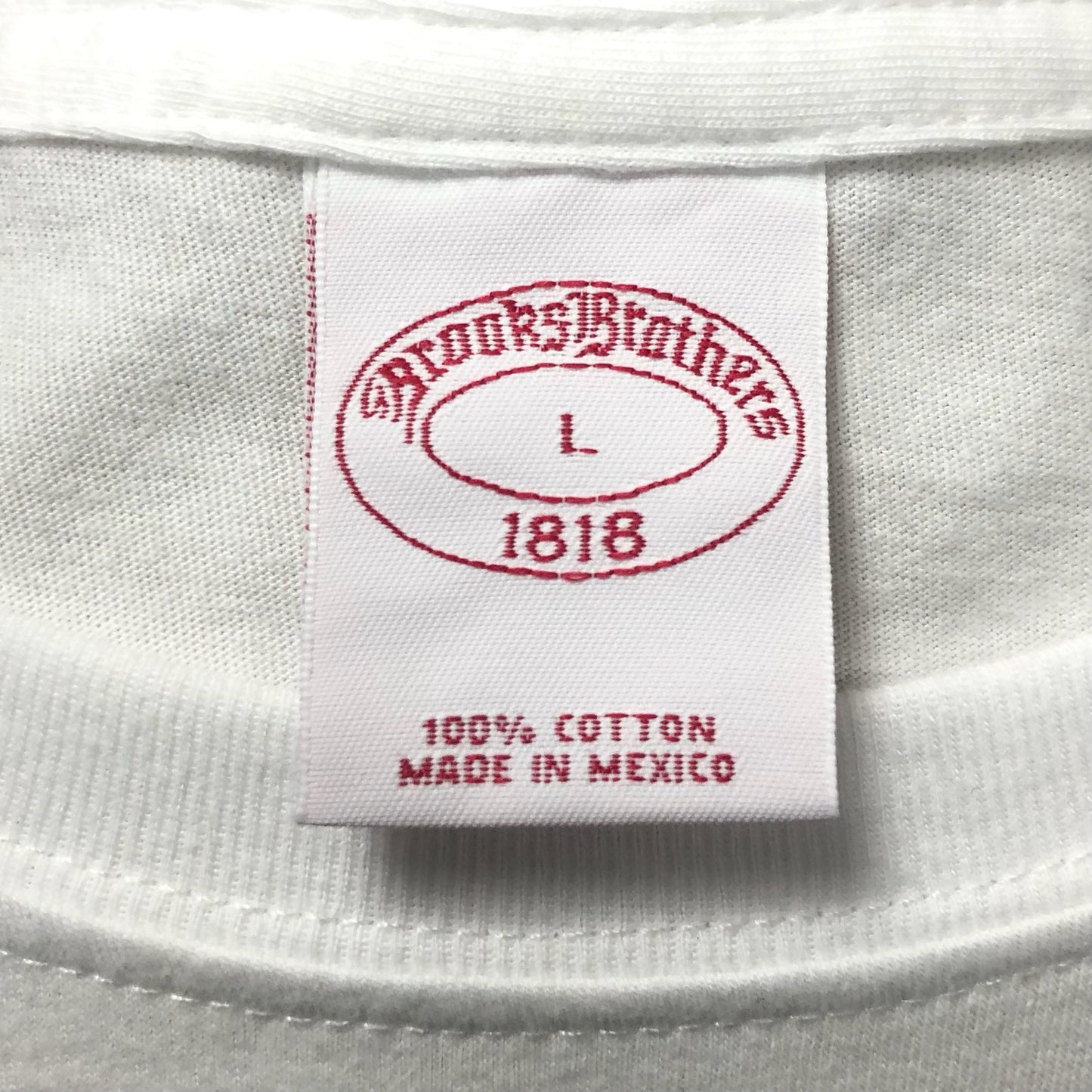 Camiseta cuello redondo Brooks Brothers 🐑 color blanco y logo en azul navy Talla L