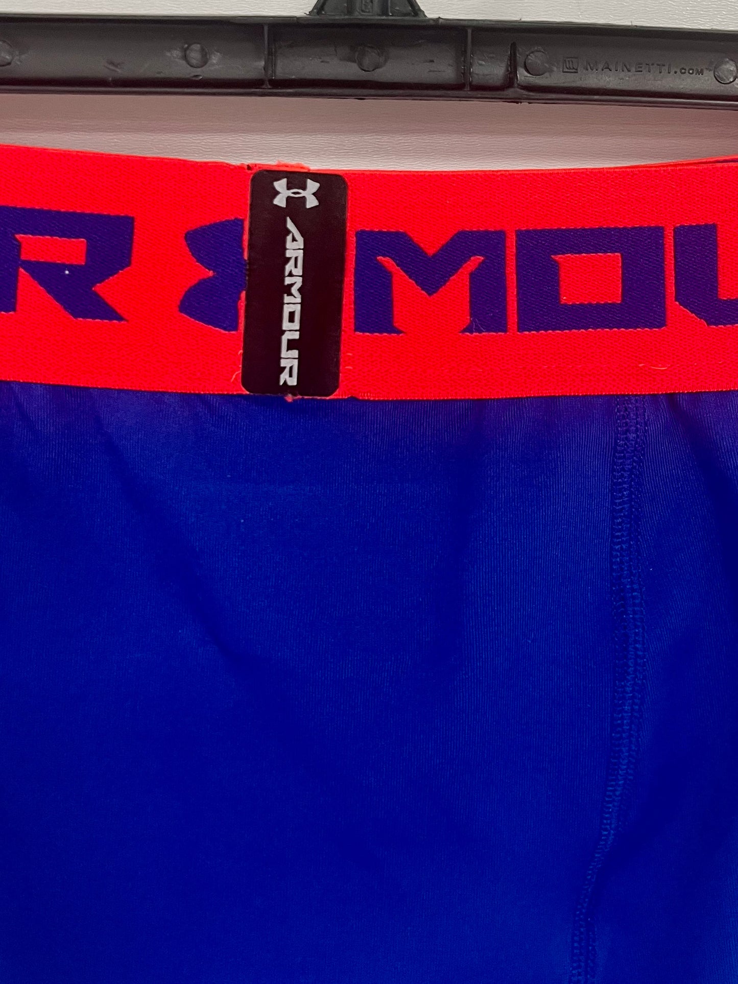 Malla de entrenamiento licra Under Armour 🏋🏽 Pro Dri-FIT para hombre en Color azul intenso y cintura rosado neón Talla L